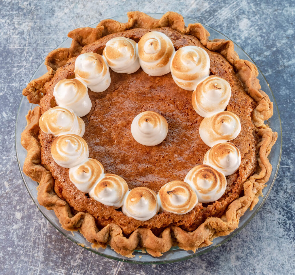 whole champagne chess pie sitting on a table