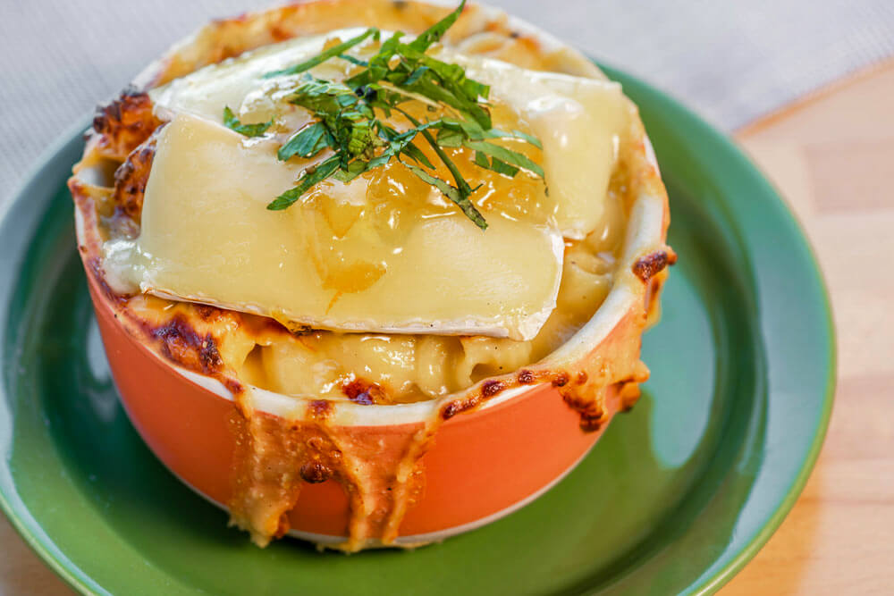 caramelized onion mac and brie in a bowl